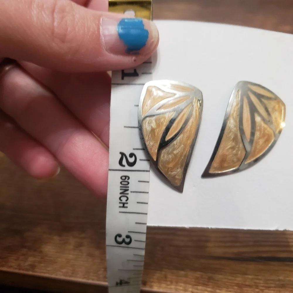 silver tone statement earrings